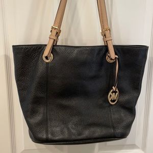 Michael kors black leather purse with tan handles